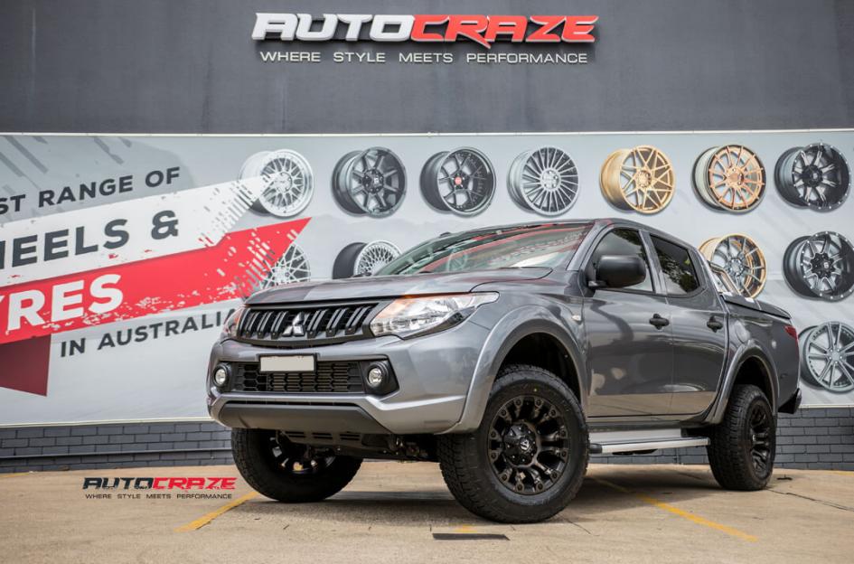 MITSUBISHI TRITON VAPOR BLACK MACHINED WITH DARK TINT